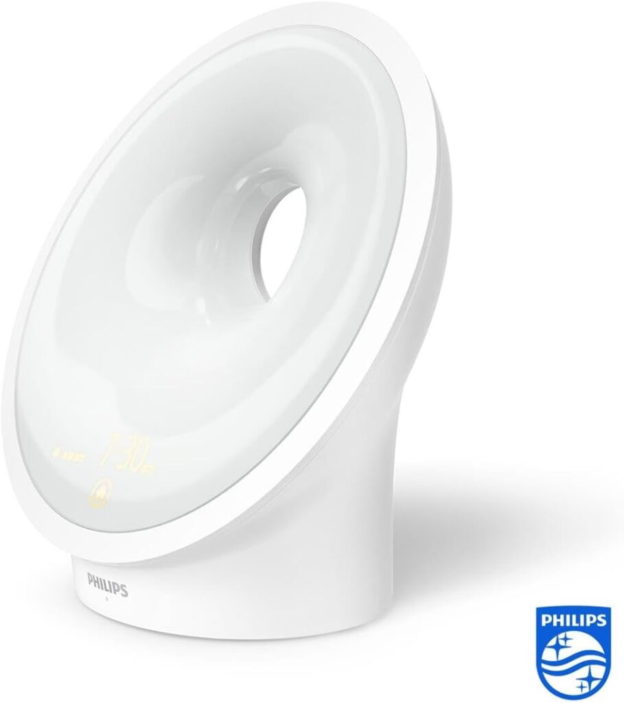 Le radio-réveil Philips SmartSleep, sur fond blanc, sans sa boîte d'emballage. La lumière est éteinte.