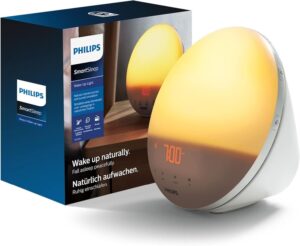 Le radio-réveil Philips SmartSleep et son emballage, vu de côté. Le visuel 1 et le visuel 2 montrent la même chose.