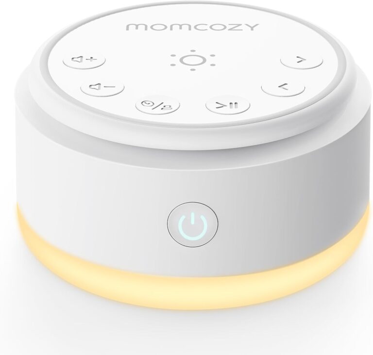 Générateur de bruit blanc Momcozy en mode lumière jaune, vue de dessus. Le bouton d'alimentation est éclairé en bleu.